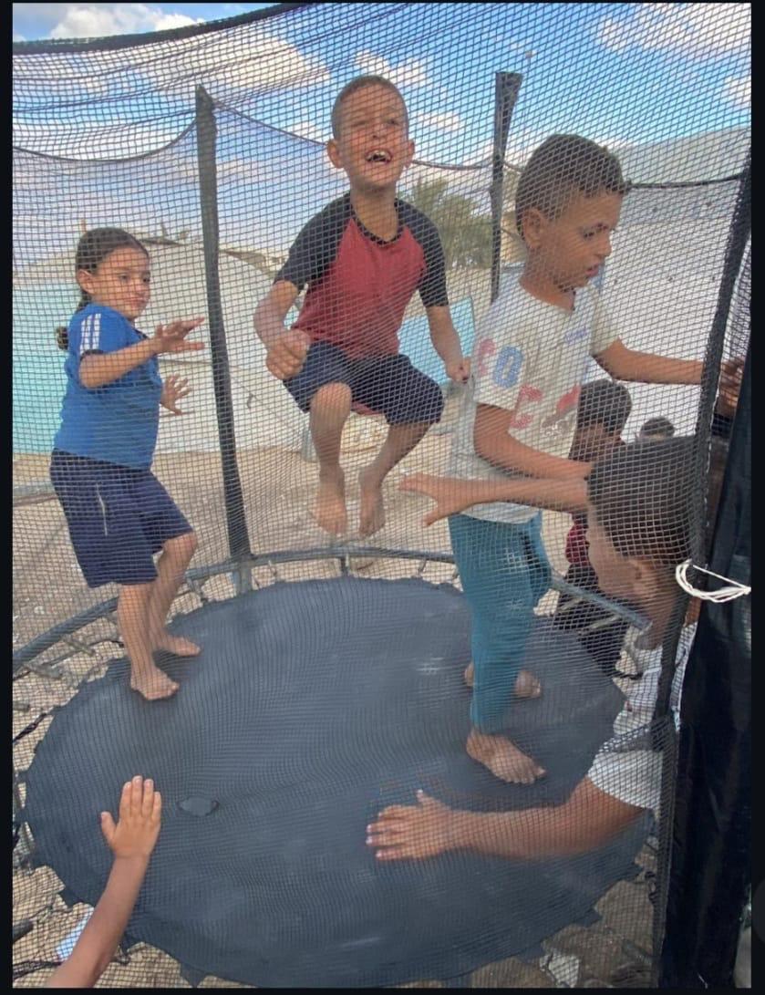 Children playing on a trampoline